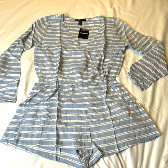 Forever 21 Pants - NWT Women’s Medium Jumpsuit Forever 21 Low Cut Front With Sorts Long Sleeve Blue